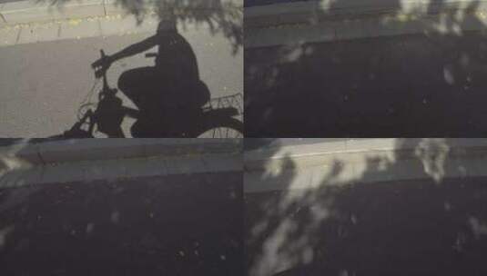 骑自行车的影子高清在线视频素材下载