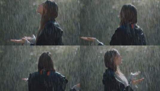 女人站在雨中淋雨高清在线视频素材下载