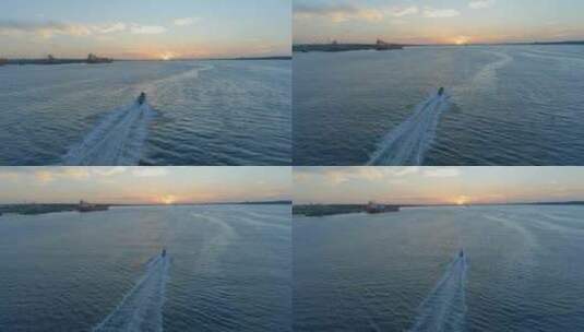 在南安普敦码头前行驶的摩托艇高清在线视频素材下载
