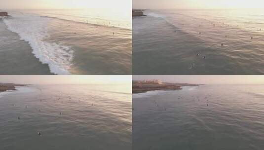 海岸线鸟瞰图海平面日落黄昏浪花拍打海浪高清在线视频素材下载