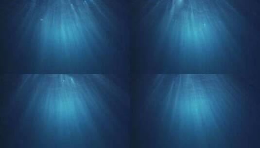 水下光线穿过深蓝色的海浪高清在线视频素材下载