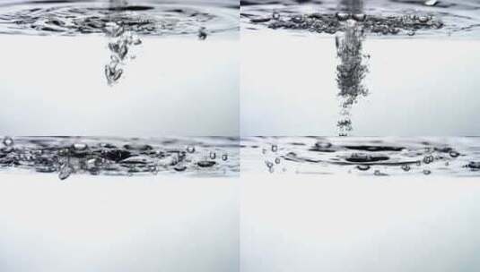 水滴入水面——白色背景高清在线视频素材下载