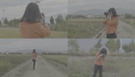 4k大理女孩在喜洲田野中拍照片V-LOG格式高清在线视频素材下载