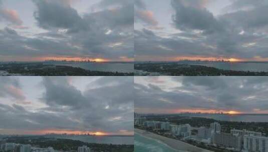 城市海岸边的日落余晖航拍高清在线视频素材下载