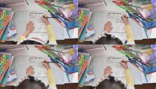 幼儿园儿童桌上学写字写英文字母高清在线视频素材下载