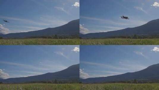 飞机在田野上空低空飞行高清在线视频素材下载