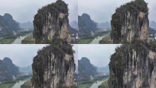 航拍攀登桂林阳朔矮山的攀岩者高清在线视频素材下载