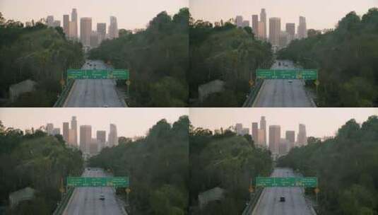 在通往城市的几乎空无一人的高速公路上行驶高清在线视频素材下载