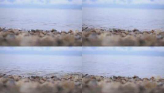 流水冲刷岸边的石头高清在线视频素材下载