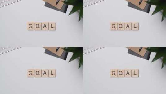 桌面上的木板拼成的goal单词高清在线视频素材下载