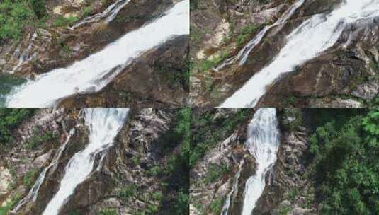 三亚热带雨林壮观的瀑布航拍高清在线视频素材下载