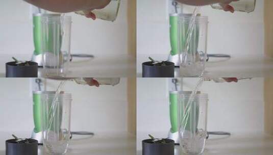将水倒入通用搅拌机杯高清在线视频素材下载