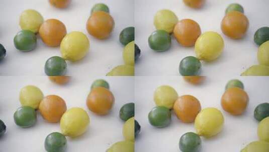白色背景下柑橘在水中的SLOMO高清在线视频素材下载