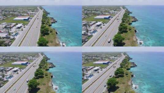 多米尼加共和国夏季沿加勒比海行驶在拉斯美洲公路上的车辆。-高清在线视频素材下载