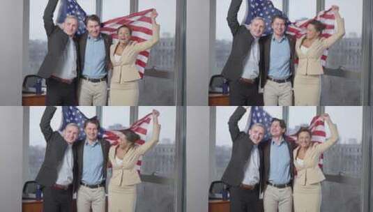 乐观的美国商业团队在办公室悬挂国旗高清在线视频素材下载