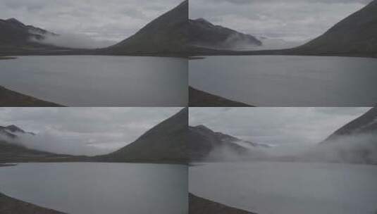 雾气盖住雪山湖高清在线视频素材下载