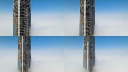 雾霾笼罩下探出云端的天津117大厦航拍高清在线视频素材下载