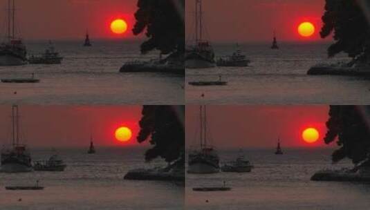 红色的克罗地亚太阳正坐在水面上高清在线视频素材下载