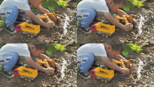亚洲中国人小朋友玩挖掘机玩沙子高清在线视频素材下载