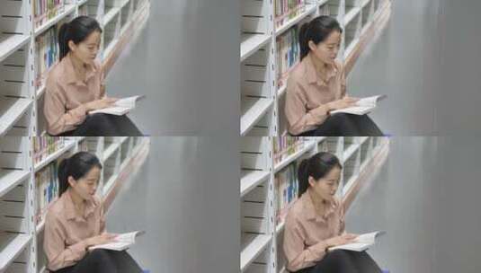 亚洲东方中国女性在图书馆看书学习高清在线视频素材下载