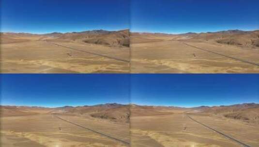 西藏高原蓝天雪山道路航拍高清在线视频素材下载