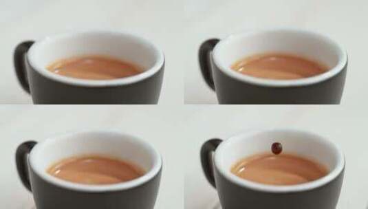 一滴咖啡滴入一杯咖啡里高清在线视频素材下载