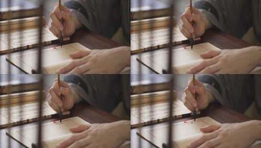 古代文人用毛笔抄写中国传统文学高清在线视频素材下载
