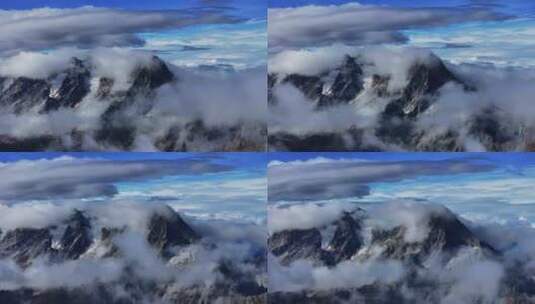云层中的白马雪山高清在线视频素材下载