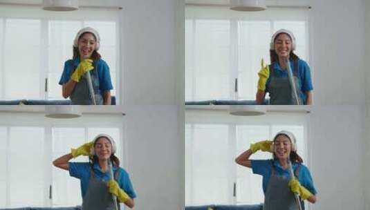 快乐的亚洲家庭主妇在清理过程中用拖把作为高清在线视频素材下载
