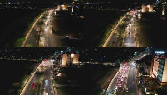 夜晚航拍城市车辆在道路上行驶高清在线视频素材下载