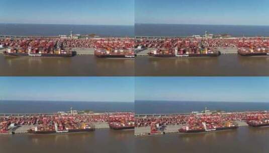 港口航拍环绕-岸边停靠船和桥吊高清在线视频素材下载
