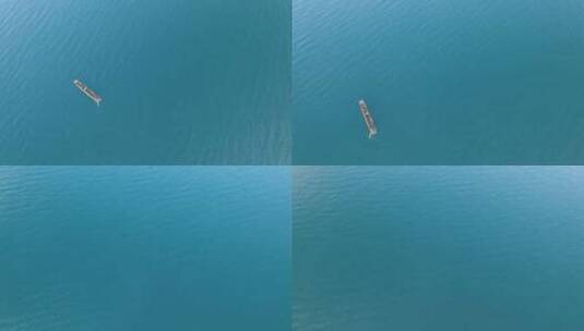 云南泸沽湖水上的船航拍高清在线视频素材下载