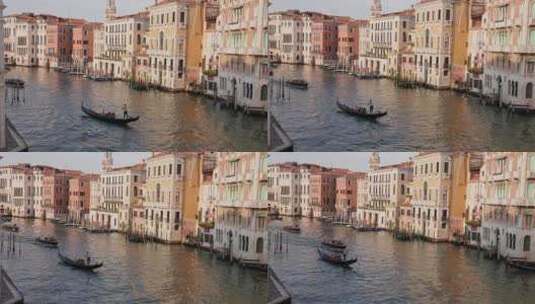 威尼斯船夫撑船穿过意大利威尼斯的绿色运河高清在线视频素材下载