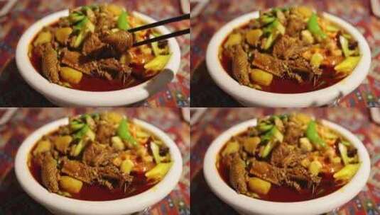 美味的新疆大盘鸡高清在线视频素材下载