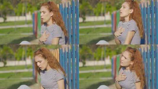 年轻女子在户外呼吸急促。高清在线视频素材下载