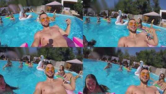 生活方式博客男子在游泳池里用动作相机自拍高清在线视频素材下载