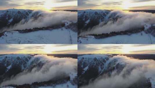 冰冷雪山山顶流动的晨雾高清在线视频素材下载