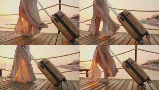 一个穿着裙子的女人拉着行李箱走在码头上高清在线视频素材下载