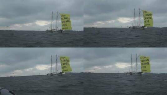 挂着国旗的船宣布全球变暖结束高清在线视频素材下载
