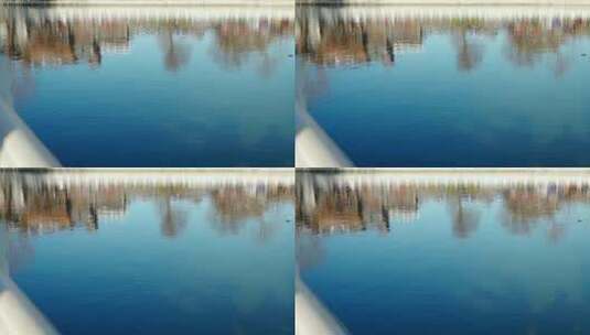 晴朗初冬北京什刹海湖面上的倒影高清在线视频素材下载