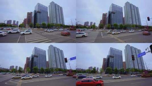 城市街道路口车辆高楼高清在线视频素材下载