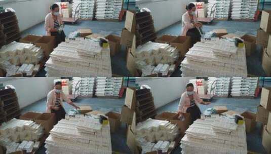 女人整理大米包装盒高清在线视频素材下载
