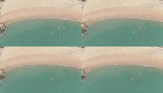俯拍沙滩海浪游船高清在线视频素材下载