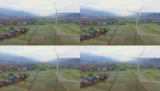 航拍西昌农村风电机组在田间运转高清在线视频素材下载