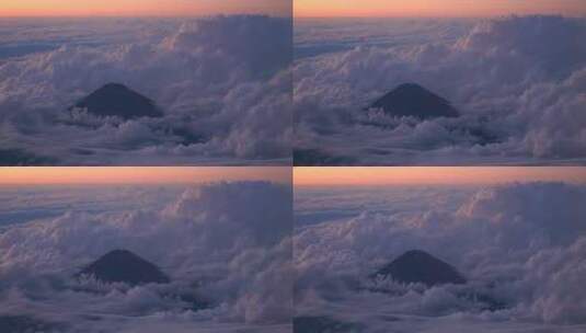 飞机上航拍夕阳下的富士山高清在线视频素材下载