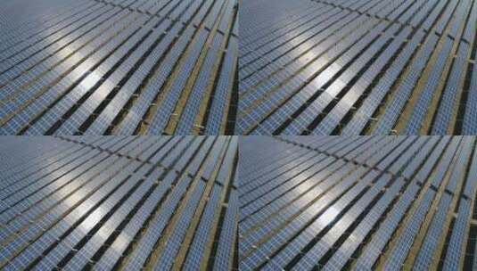 阳光下的太阳能发电站航拍高清在线视频素材下载