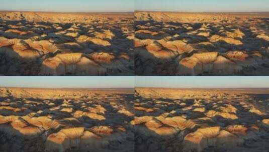 日落时分的新疆昌吉奇台魔鬼城戈壁丹霞地貌高清在线视频素材下载