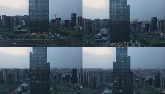 航拍成都傍晚亮灯的OPPO大厦高清在线视频素材下载