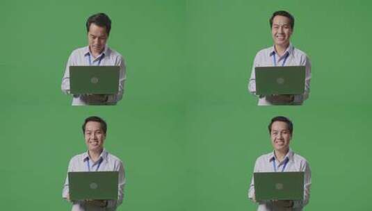 男人微笑着使用电脑高清在线视频素材下载