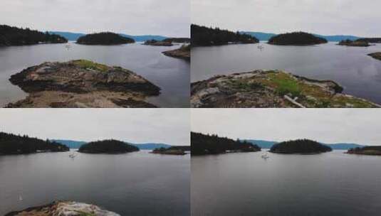 无人机拍摄不列颠哥伦比亚省的岛屿和帆船。高清在线视频素材下载